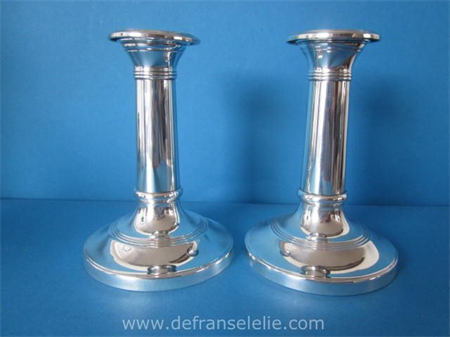 a pair of Dutch sterling silver weighted candlesticks