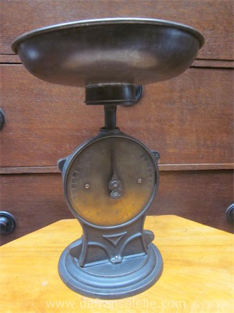 an antique Salters family scale with brass face