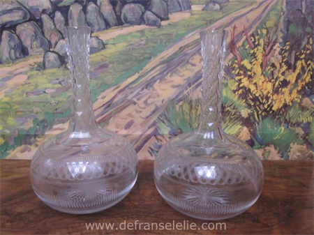 a pair of antique cut glass water carafes