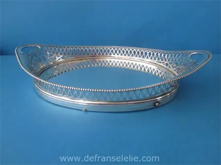 an antique small boat shaped Dutch silver serving tray