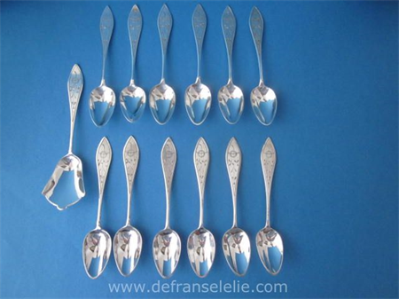 a set of twelve antique Dutch silver teaspoons including matching sugar spoon