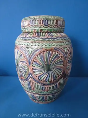 a handmade Frisian earthenware kerfsnede jar with cover