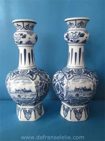 a pair of Delft style earthenware double gourd vases