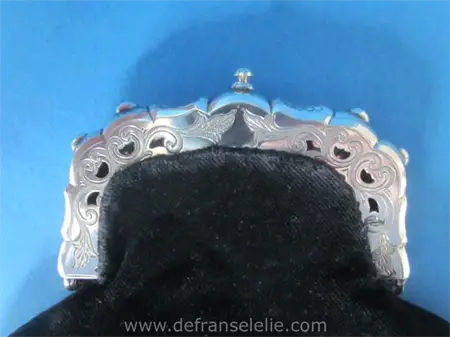 an antique Dutch silver purse with the crest of the seven Provinces of Holland