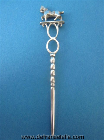 an antique Dutch silver pipe cleaner