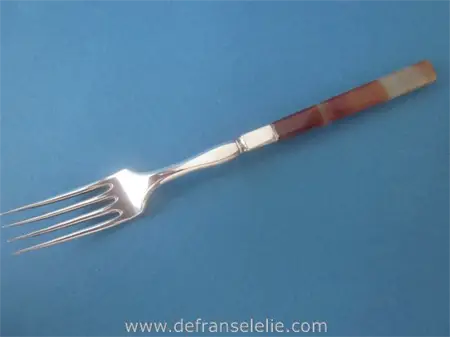 an antique Dutch silver serving fork with agate handle