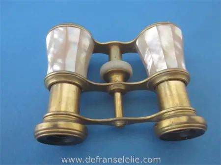 an antique mother of pearl opera glasses
