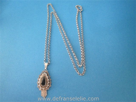an antique Dutch silver necklace pendant