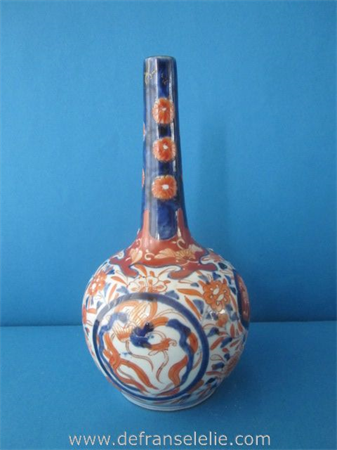 an antique Japanese imari porcelain longneck vase