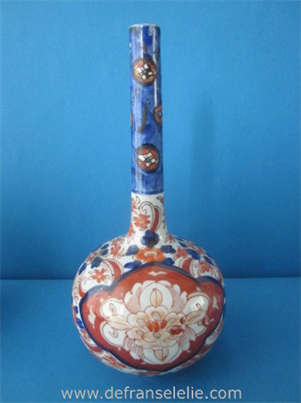 an antique Japanese imari porcelain longneck vase