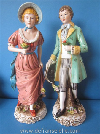 a pair of vintage German porcelain figures 