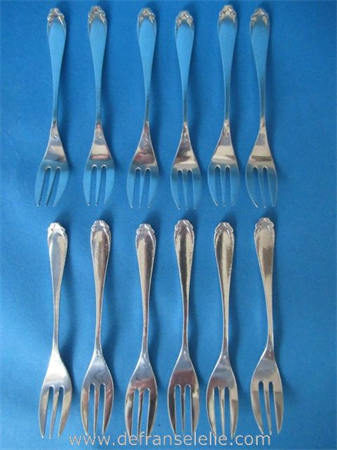 a set of twelve antique Dutch silver cake forks