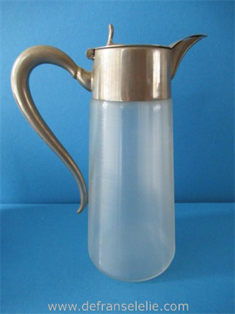 an antique English glass jug