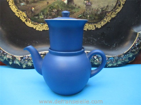 a vintage blue earthenware cafetière
