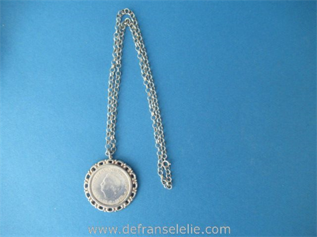 a vintage Dutch silver coin pendant