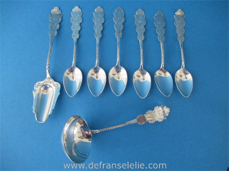 a set of six vintage Dutch silver teaspoons including matching sugar and cream spoon