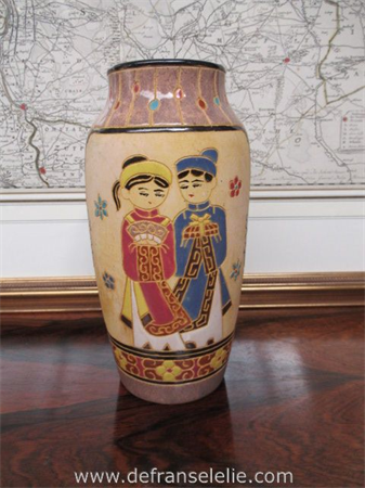 a vintage polychrome earthenware vase