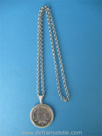een vintage Hollands zilveren collier met zilveren 10 gulden munt