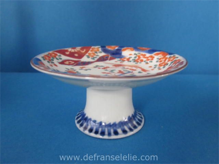 an antique Japanese imari porcelain stand