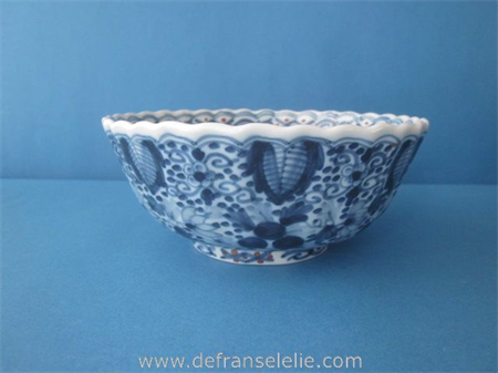 an earthenware hand painted blue and white Makkum bowl