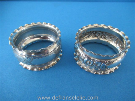  two antique sterling silver napkin rings